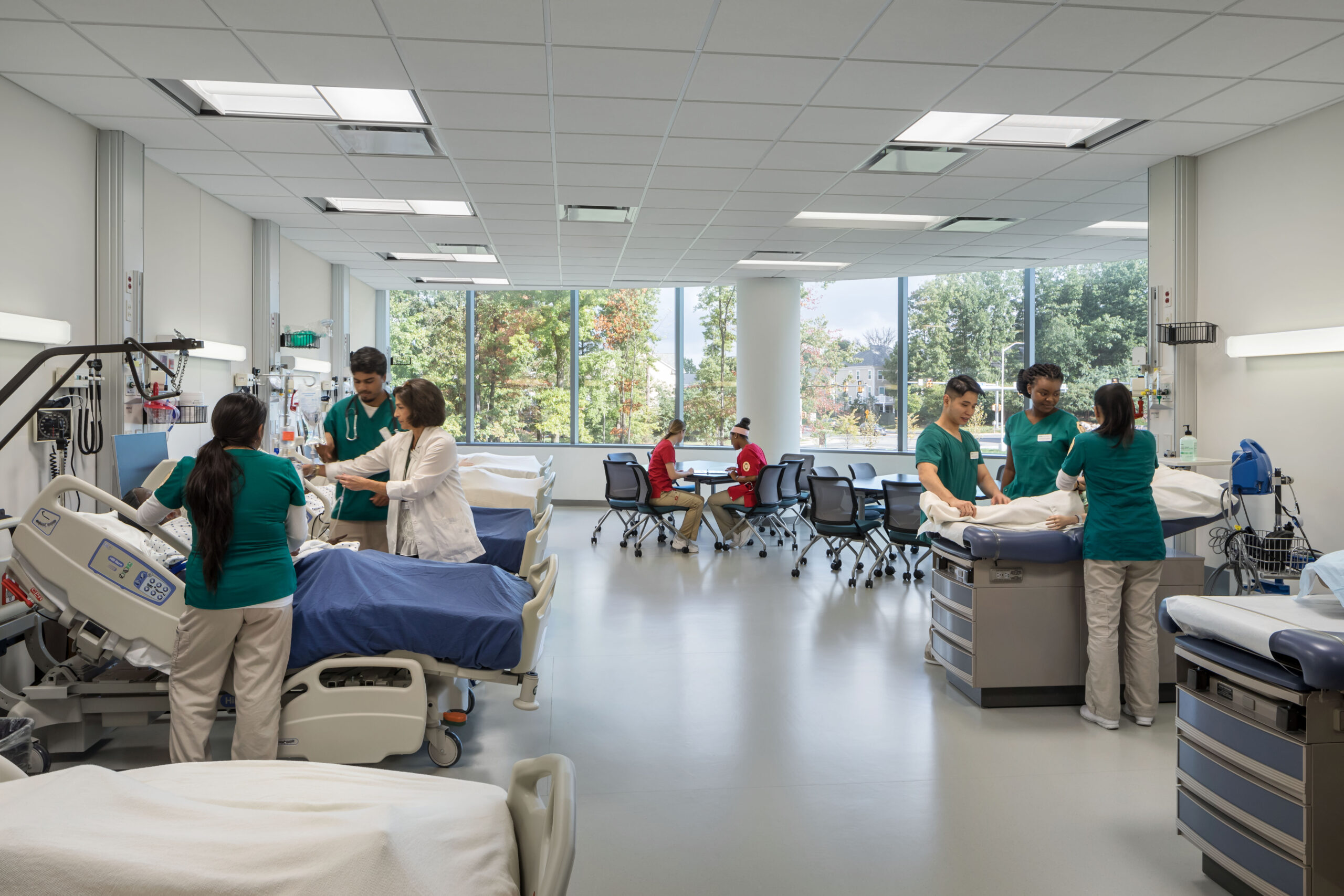 Interior view of a nursing simulation lab with medical equipment and realistic clinical training spaces.